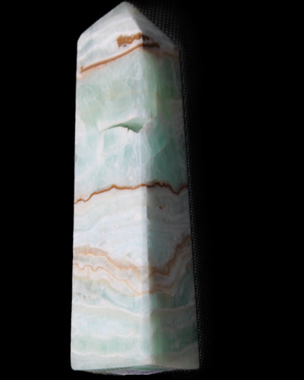 Pistachio Calcite obelisk 134mm 339g in sunlight - Rocks and Things Store