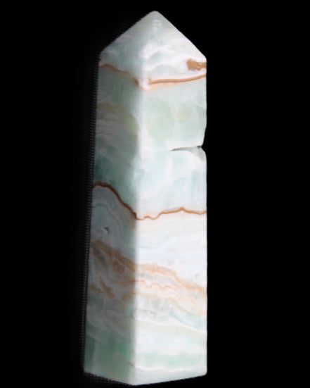 Pistachio Calcite obelisk 134mm 339g in sunlight - Rocks and Things Store