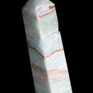 Pistachio Calcite obelisk 134mm 339g in sunlight - Rocks and Things Store