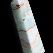 Pistachio Calcite obelisk 134mm 339g in sunlight - Rocks and Things Store