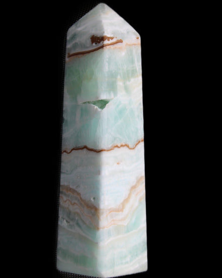 Pistachio Calcite obelisk 134mm 339g in sunlight - Rocks and Things Store