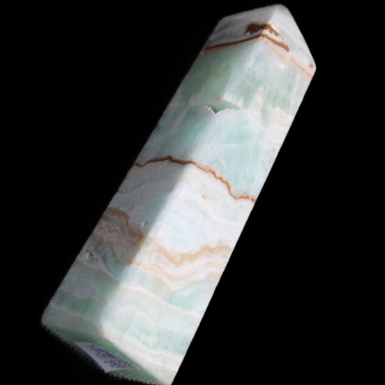 Pistachio Calcite obelisk 134mm 339g in sunlight - Rocks and Things Store