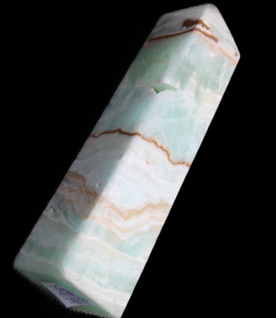 Pistachio Calcite obelisk 134mm 339g in sunlight - Rocks and Things Store