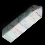 Pistachio Calcite obelisk 134mm 339g in sunlight - Rocks and Things Store