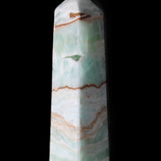 Pistachio Calcite obelisk 134mm 339g in sunlight - Rocks and Things Store