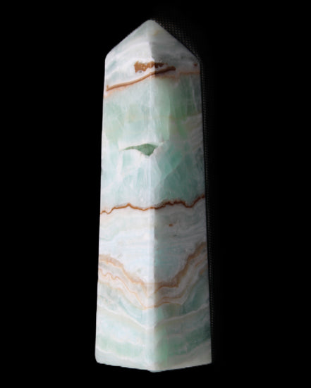 Pistachio Calcite obelisk 134mm 339g in sunlight - Rocks and Things Store