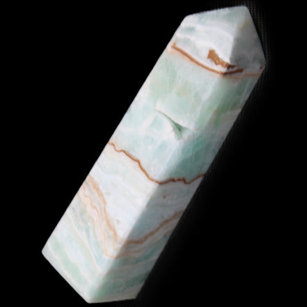 Pistachio Calcite obelisk 134mm 339g in sunlight - Rocks and Things Store