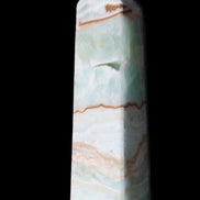 Pistachio Calcite obelisk 134mm 339g in sunlight - Rocks and Things Store