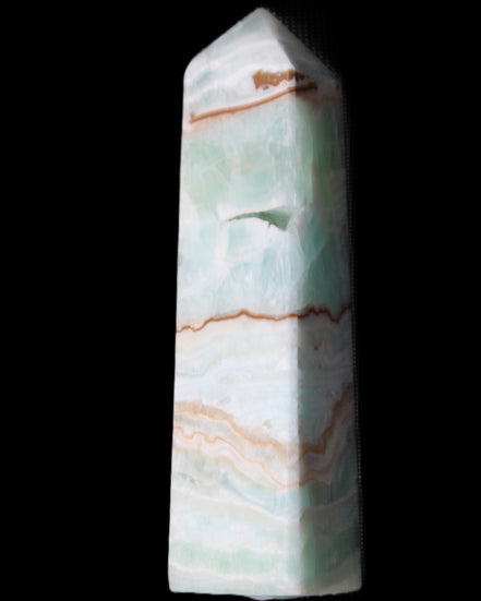 Pistachio Calcite obelisk 134mm 339g in sunlight - Rocks and Things Store