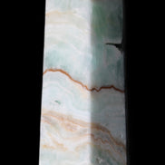 Pistachio Calcite obelisk 134mm 339g in sunlight - Rocks and Things Store
