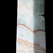 Pistachio Calcite obelisk 134mm 339g in sunlight - Rocks and Things Store