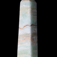 Pistachio Calcite obelisk 132mm 304g in sunlight - Rocks and Things Store
