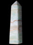 Pistachio Calcite obelisk 132mm 304g in sunlight - Rocks and Things Store