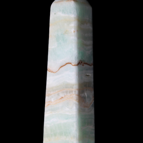 Pistachio Calcite obelisk 132mm 304g in sunlight - Rocks and Things Store
