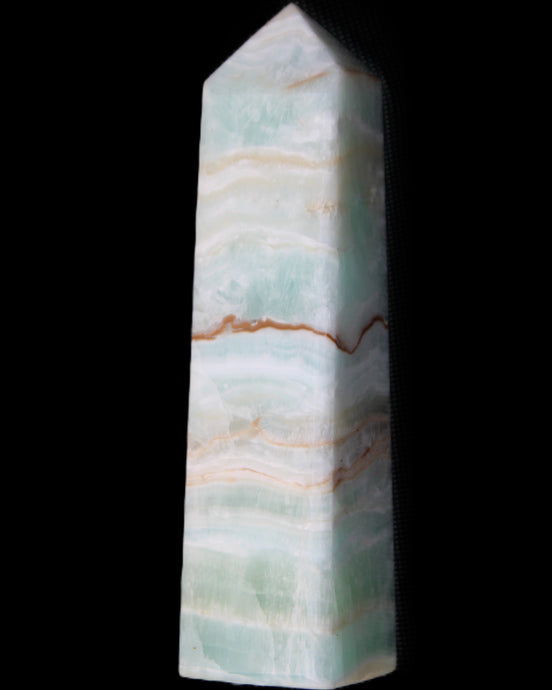 Pistachio Calcite obelisk 132mm 304g in sunlight - Rocks and Things Store