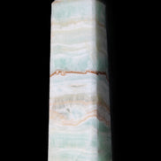Pistachio Calcite obelisk 132mm 304g in sunlight - Rocks and Things Store