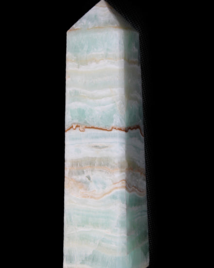 Pistachio Calcite obelisk 132mm 304g in sunlight - Rocks and Things Store
