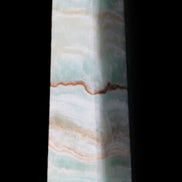 Pistachio Calcite obelisk 132mm 304g in sunlight - Rocks and Things Store