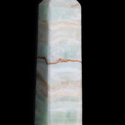 Pistachio Calcite obelisk 132mm 304g in sunlight - Rocks and Things Store