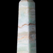 Pistachio Calcite obelisk 132mm 304g in sunlight - Rocks and Things Store
