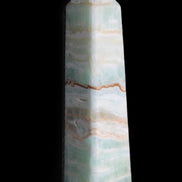 Pistachio Calcite obelisk 132mm 304g in sunlight - Rocks and Things Store