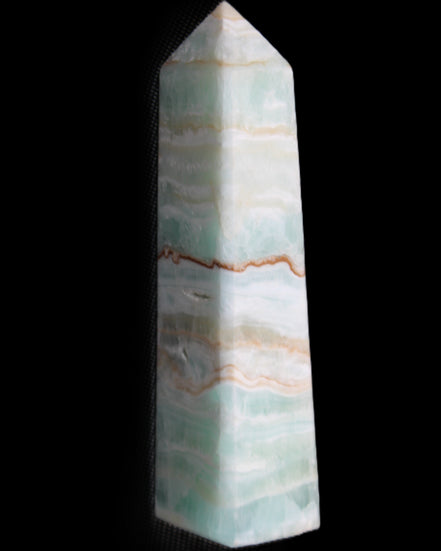 Pistachio Calcite obelisk 132mm 304g in sunlight - Rocks and Things Store