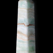 Pistachio Calcite obelisk 132mm 304g in sunlight - Rocks and Things Store