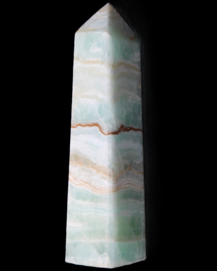 Pistachio Calcite obelisk 132mm 304g in sunlight - Rocks and Things Store