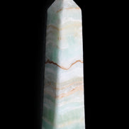 Pistachio Calcite obelisk 132mm 304g in sunlight - Rocks and Things Store