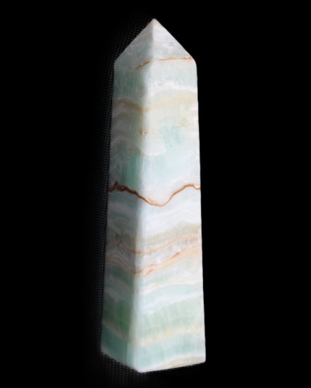 Pistachio Calcite obelisk 132mm 304g in sunlight - Rocks and Things Store
