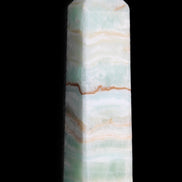 Pistachio Calcite obelisk 132mm 304g in sunlight - Rocks and Things Store