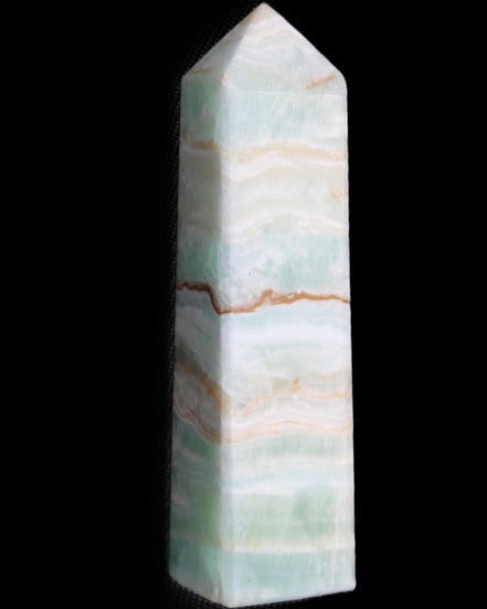 Pistachio Calcite obelisk 132mm 304g in sunlight - Rocks and Things Store