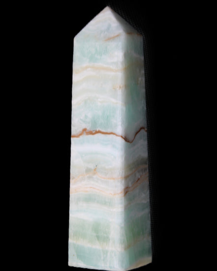 Pistachio Calcite obelisk 132mm 304g in sunlight - Rocks and Things Store