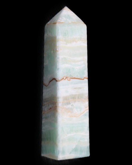 Pistachio Calcite obelisk 132mm 304g in sunlight - Rocks and Things Store