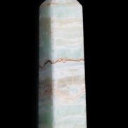 Pistachio Calcite obelisk 132mm 304g in sunlight - Rocks and Things Store