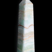Pistachio Calcite obelisk 132mm 304g in sunlight - Rocks and Things Store