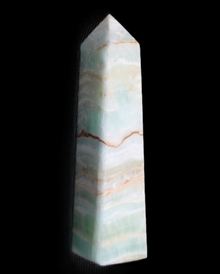 Pistachio Calcite obelisk 132mm 304g in sunlight - Rocks and Things Store