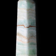 Pistachio Calcite obelisk 132mm 304g in sunlight - Rocks and Things Store