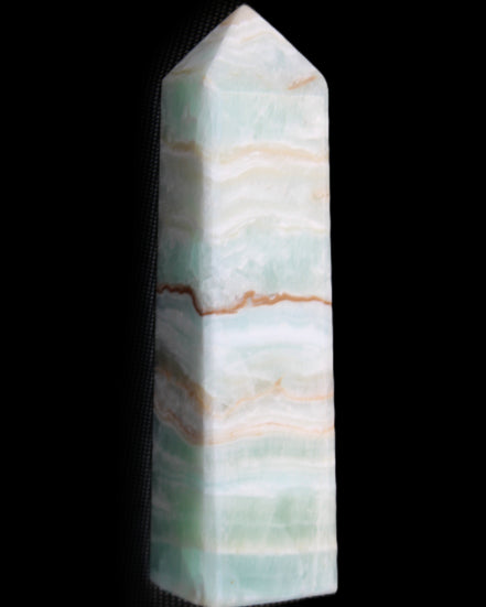 Pistachio Calcite obelisk 132mm 304g in sunlight - Rocks and Things Store