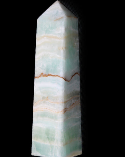Pistachio Calcite obelisk 132mm 304g in sunlight - Rocks and Things Store