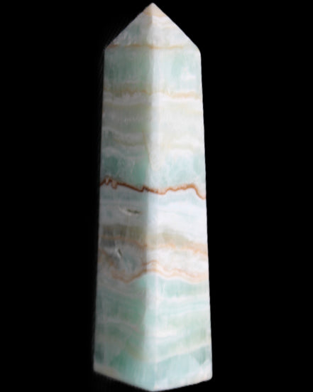 Pistachio Calcite obelisk 132mm 304g in sunlight - Rocks and Things Store
