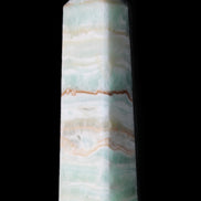 Pistachio Calcite obelisk 132mm 304g in sunlight - Rocks and Things Store