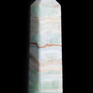 Pistachio Calcite obelisk 132mm 304g in sunlight - Rocks and Things Store