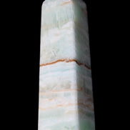 Pistachio Calcite obelisk 122mm 290g in sunlight - Rocks and Things Store