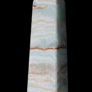 Pistachio Calcite obelisk 122mm 290g in sunlight - Rocks and Things Store