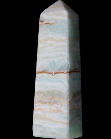 Pistachio Calcite obelisk 122mm 290g in sunlight - Rocks and Things Store