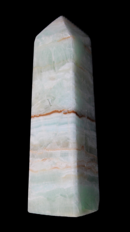 Pistachio Calcite obelisk 122mm 290g in sunlight - Rocks and Things Store