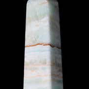 Pistachio Calcite obelisk 122mm 290g in sunlight - Rocks and Things Store