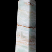 Pistachio Calcite obelisk 122mm 290g in sunlight - Rocks and Things Store