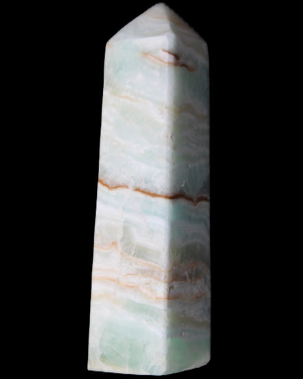 Pistachio Calcite obelisk 122mm 290g in sunlight - Rocks and Things Store